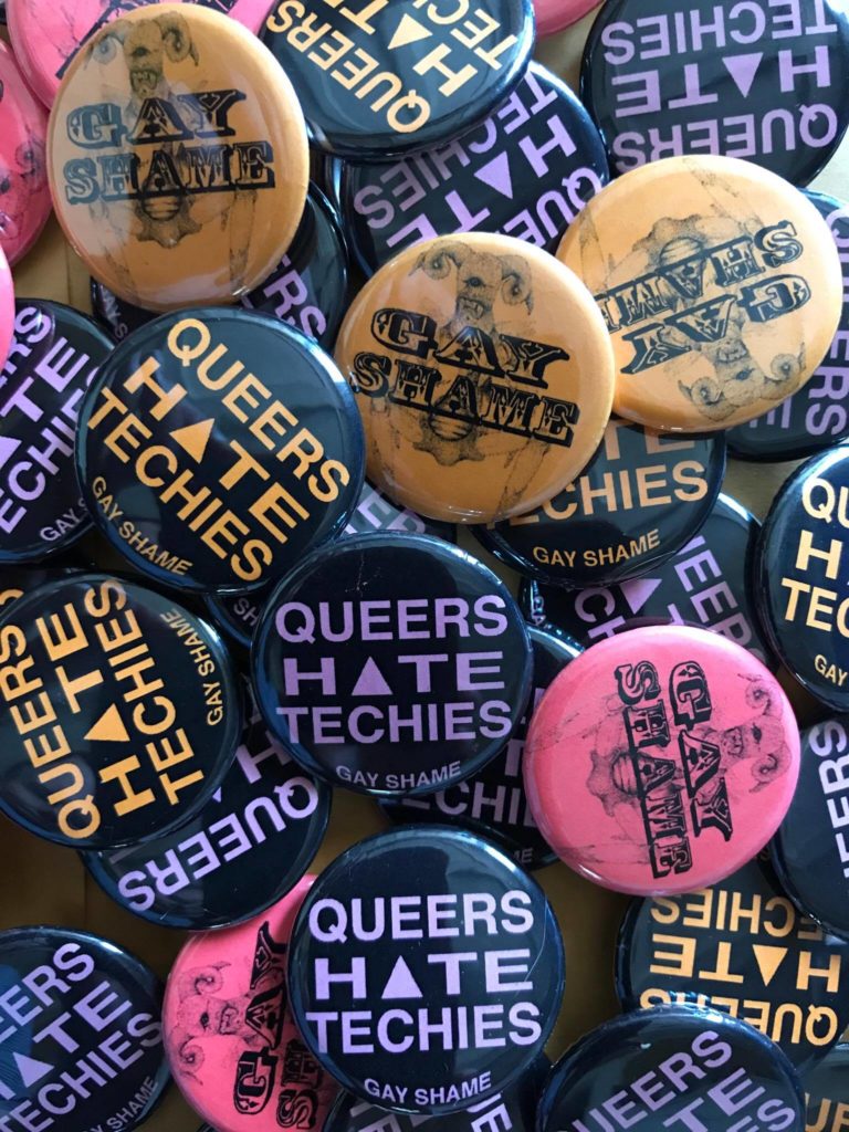 a pile of queers hate techies buttons
