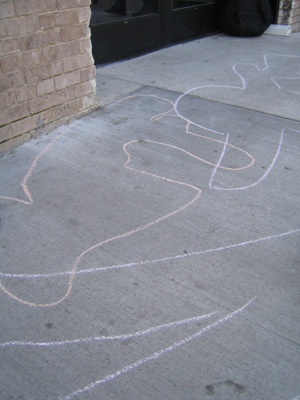 chalk outlines on the ground in front of the brand new coldwell banker office on market near castro