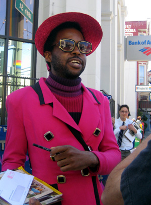 a person in pink dressed as a realtor with a clipboard