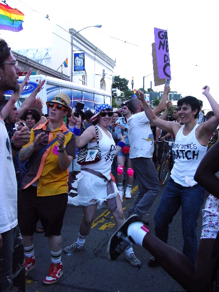 a dance party ensues at the end of the procession on castro street